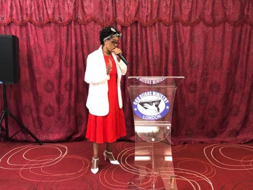 Pastor Nene during church opening prayer.