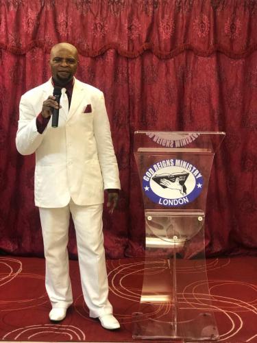 Bishop Udeme Ekpe preaching.